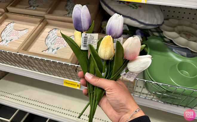 A Person Holding Fake Plant Tulips at Target Bullseye Playground