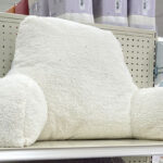 Faux Shearling Bed Rest Pillow on a Shelf