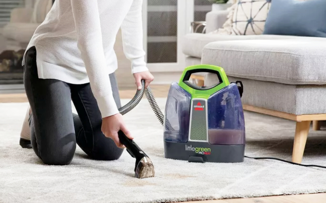 Lady Cleaning Her Carpet Using Bissell Little Green ProHeat Portable Deep Cleaner