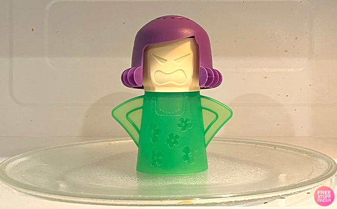 Angry Mama Microwave Cleaner in Green Color on the Rotating Dish in the Microwave