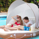 Costway Floating Island Inflatable Swimming Pool Float Lounge Raft with Canopy on a Pool