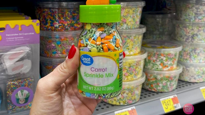 Hand Holding a Great Value Carrot Sprinkles Mix in Front of the Store Shelf