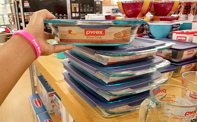 Hand Holding Pyrex Easy Grab 3 Quart Covered Baking Dish