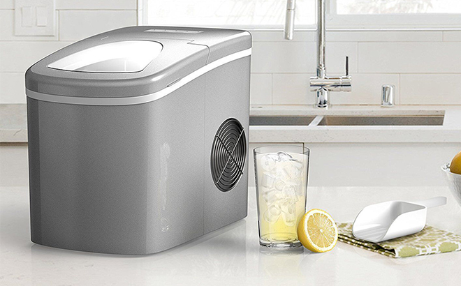 Homelabs Portable Ice Maker Machine for Countertop makes 26 lbs of Ice per 24 hours on a table