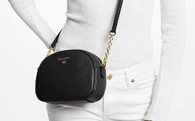 Closet Cravings - Sold**Michael Kors white leather purse with gold chain  strap. Can be worn as a shoulder bag or crossbody $138.75.