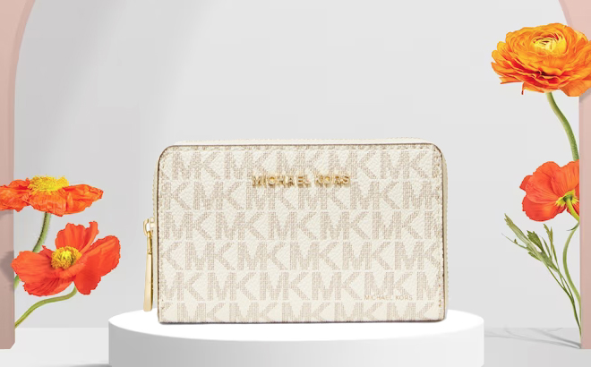 Michael Kors Small Logo Leather Wallet on a Podium