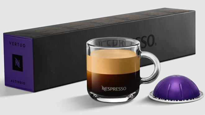 Nespresso Vertuo Line Altissio Capsule Pods on a Table with a Coffee Cup