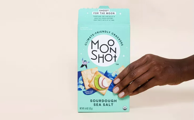 Person Holding Moonshot Organic Crackers