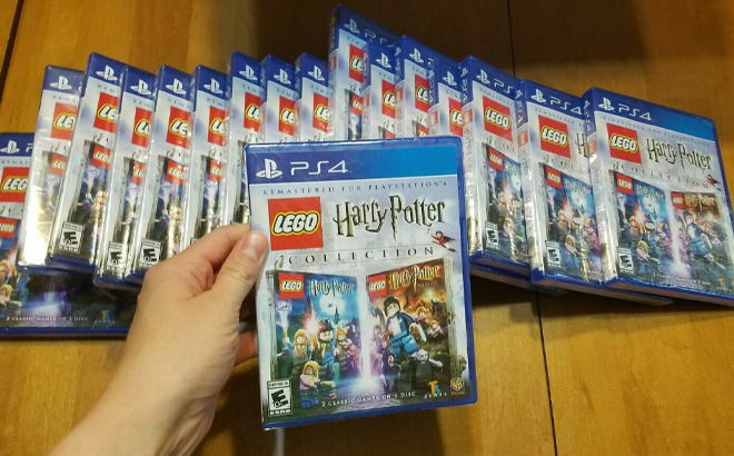 Person Holding Playstation 4 LEGO Harry Potter Collection