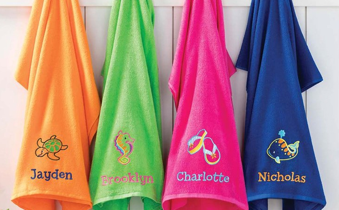 Personalized Beach Towels in four different designs