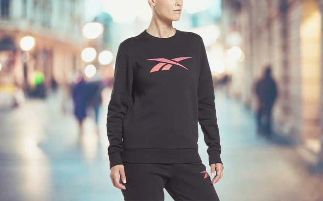 Woman Waering a Reebok Crewneck Sweatshirt