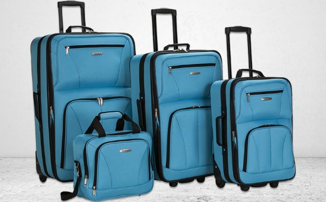 Rockland Journey Softside Upright 4 Piece Luggage Set in Turquoise on a Concrete Floor