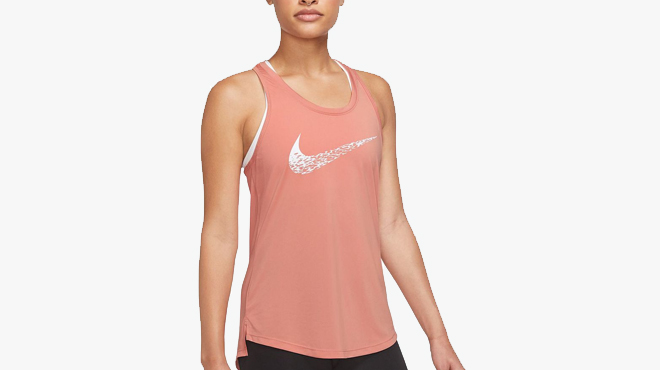 Woman wearing Nike Swoosh Run Running Tank Top