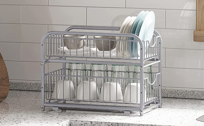 2 Tier Pull Out Cabinet Organizer Filled with Dishes and Mugs