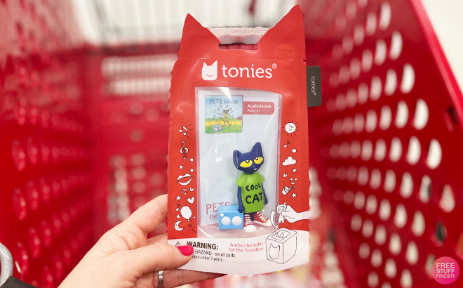 A Hand Holding Tonies Pete the Cat Audio Play Figurine