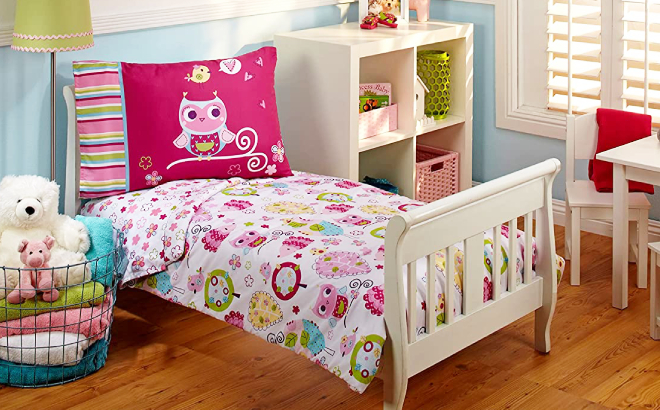 Bed Covered with 4 Piece Bedding Set in Owl Pink Color