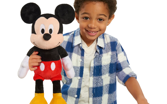 Boy Holding Disney Mickey Mouse 19 Inch Plush