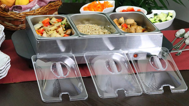 Buffet Server Food Warmer with Opened Lids on a Table