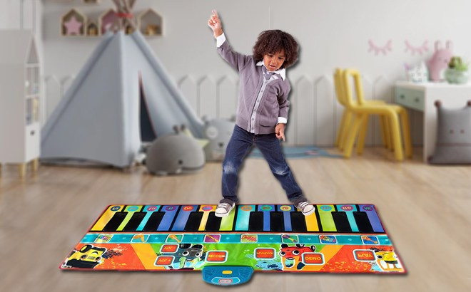 Child Playing With Little Tikes Giant Musical Piano Mat