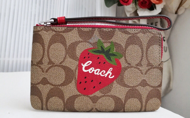 Coach Outlet Corner Zip Wristlet In Signature Canvas With Wild Strawberry