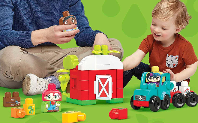 Dad and Son Playing the Fisher Price Farm 51 Piece Building Blocks Set