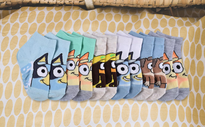 Disney Kids 5 Pack Socks on A Crib Blanket