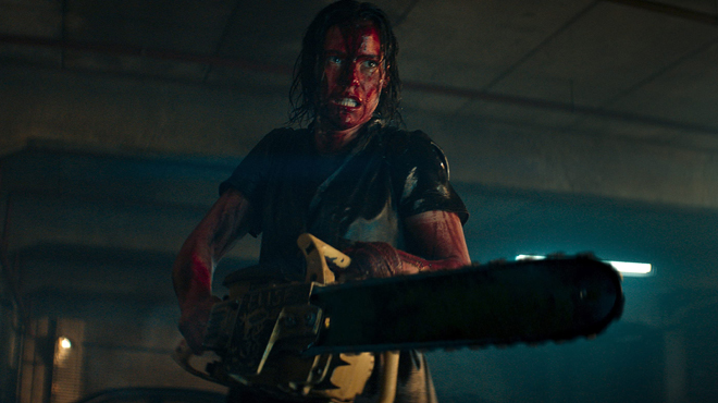 Evil Dead Rise Movie Lady with Chainsaw