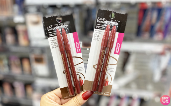 Hand Holding Maybelline Twin Brow Eye Pencils