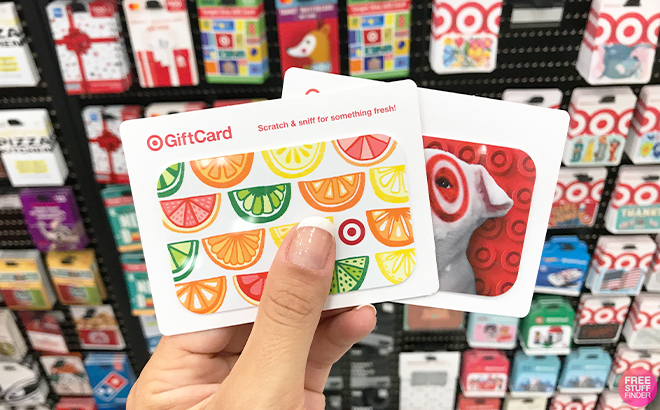 Hand Holding Two Target Gift Cards at Target