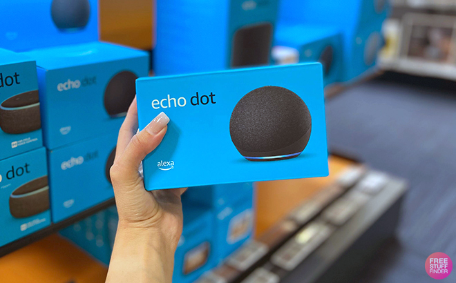 Hand holding Echo Dot 5th Generation