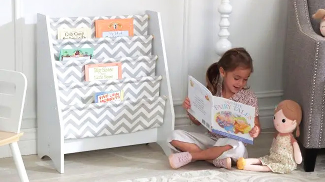 A Kid Reading a Book from KidKraft Gray Chevron Sling Bookshelf 