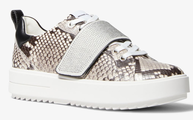 Michael Kors Emmett Embellished Snake Embossed Leather Sneakers on a Gray Background