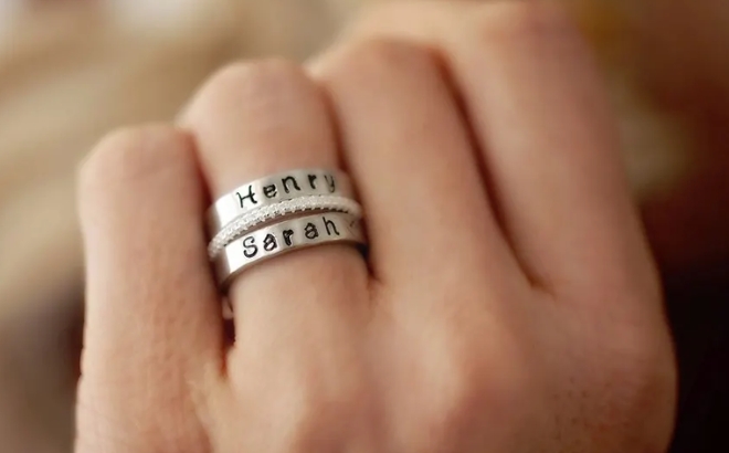 Personalized Stackable Stamp Rings with Spacer Ring on a Womans Finger