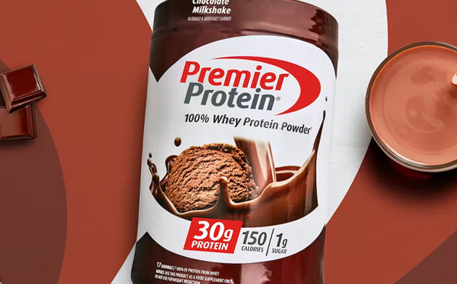 Premier Protein Powder with Chocolate Milkshake Flavor on Brown Background