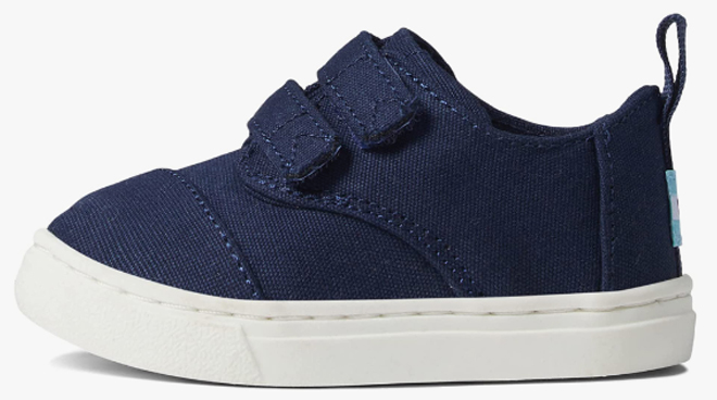 TOMS Toddler Kids Navy Cordones Canvas Sneakers on a Gray Background