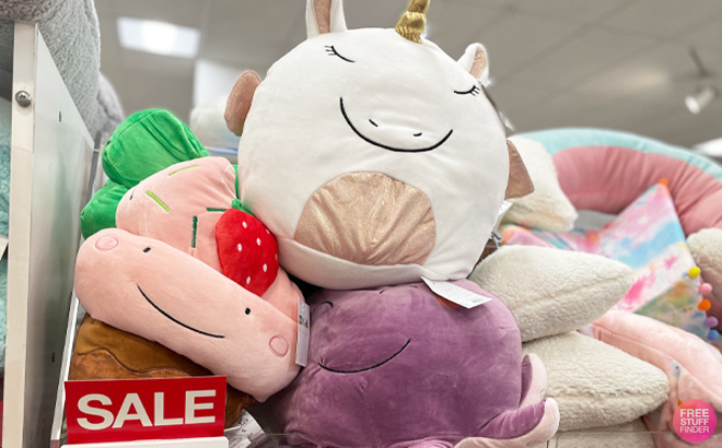 The Big One Kids Unicorn and Octopus Pillow on Store Shelf