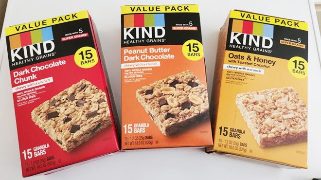 Three 15 Count Packs of Kind Healthy Grains Bars on a Countertop