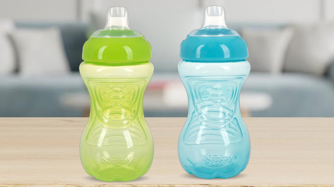 Two Nuby Sippy Cups on a Tabletop