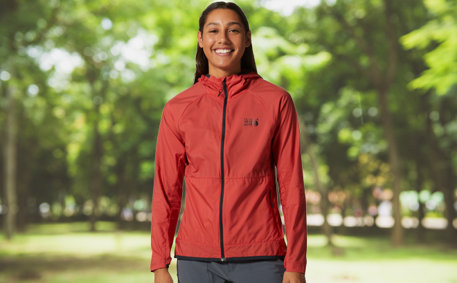 a Person Wearing a Red Mountain Hardwear Womens Kor AirShell Hoody Jacket