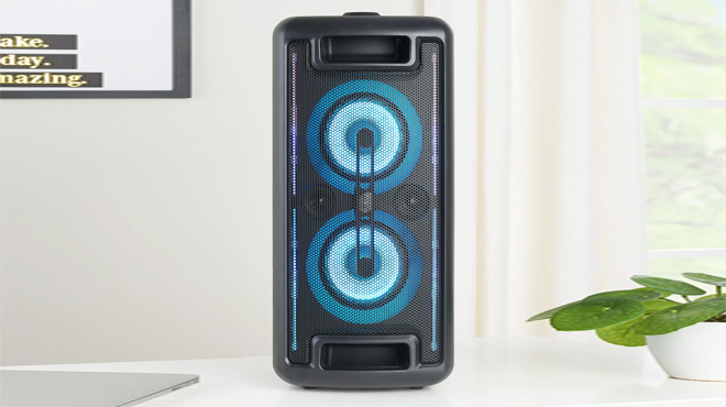 onn Large Party Speaker with LED Lighting on a Desk