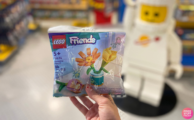 Hand Holding LEGO Friends Friendship Flower 84 Piece Set