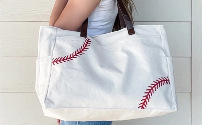 Person Carrying Baseball And Softball Shoulder Bag