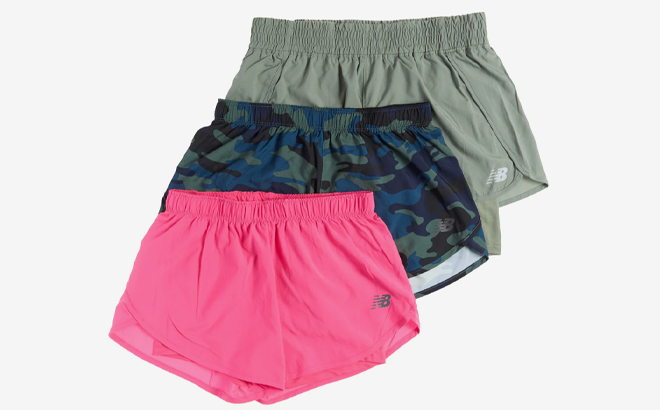 Three Pairs of New Balance Womens Shorts on a Gray Background