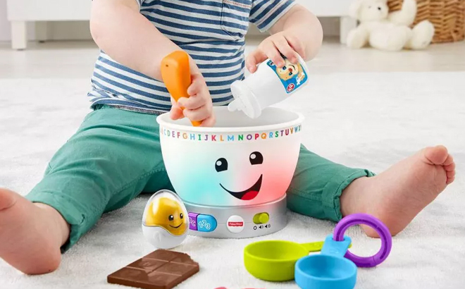 Toddler Playing with Fisher Price Laugh And Learn Magic Color Mixing Bowl