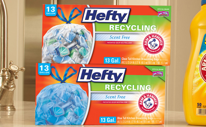 Two Boxes of Hefty Recycling Trash Bags 60 Count Scent Free on a Table