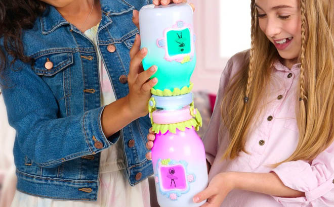 Two Girls Playing with Got2Glow Fairy Pet Finder Toy