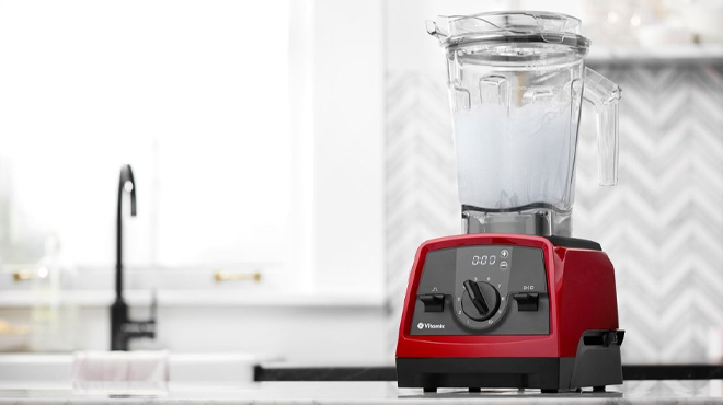 Vitamix Venturist Blender in Red Color on a Marble Table