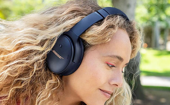 A Woman Using Bose QuietComfort Wireless Noise Cancelling Headphones