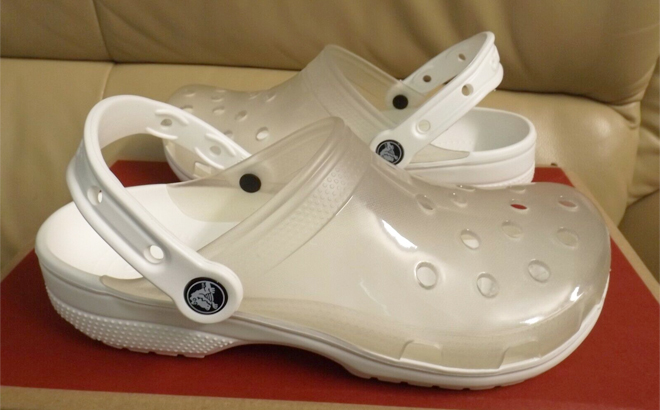 Crocs Classic Translucent Clogs on a Shoe Box