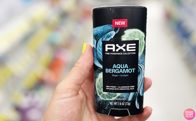 Hand Holding Axe Deodorant